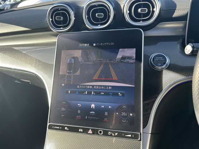 メルセデス・ベンツ Ｍ・ベンツ Ｃ２２０ｄ アバンギャルド　AMGライン 滋賀県 2022(令4)年 2万km ポーラホワイト HUD/アンビエントライト/ハーフレザーシート/・前席メモリ付きパワーシート/・前席シートヒーター/純正ナビ/３６０°カメラ/フルセグ/CarPlay/ＡＣＣ/ＢＳＭ/レーンキープ/純正ＬＥＤデジタルライト/パワートランク