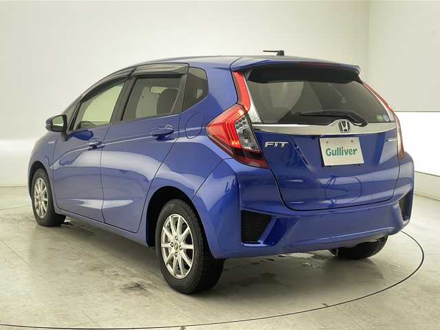 ホンダ フィット ハイブリット Lパッケージ 千葉県 2014(平26)年 5.8万km ブリリアントスポーティブルーメタリック2トーン 横滑り防止/ダブルエアバック/スマートキー/プッシュスタート/純正テレビナビ　ギャザーズ/CD/USB/BT/バックカメラ/クルーズコントロール/ビルトインETC/オートライト/純正フロアマット/電動格納ドアミラー/ドライブレコーダー