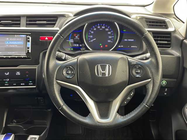 ホンダ フィット ハイブリット Lパッケージ 千葉県 2014(平26)年 5.8万km ブリリアントスポーティブルーメタリック2トーン 横滑り防止/ダブルエアバック/スマートキー/プッシュスタート/純正テレビナビ　ギャザーズ/CD/USB/BT/バックカメラ/クルーズコントロール/ビルトインETC/オートライト/純正フロアマット/電動格納ドアミラー/ドライブレコーダー