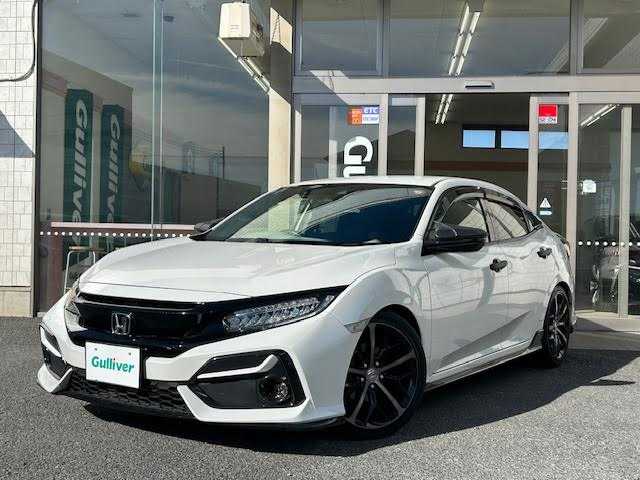 ホンダ シビック ハッチバック 埼玉県 2020(令2)年 8.7万km プラチナホワイトパール Honda SENSING/レーンキープアシスト/レーダークルーズコントロール/純正ナビ/　　Bluetooth/DVD再生機能/CD/フルセグTV/バックカメラ/LEDヘッドライト/純正18インチアルミホイール/ETC/前席パワーシート/シートヒーター/アイドリングストップ/ECON/ブレーキホールド/純正マフラー/社外ウイング/純正ウイング車載あり/無限MUGENフロアマット/SPOON プログレッシブスプリング リア2本/カーボン調ドアミラーカバー/ドアプロテクター