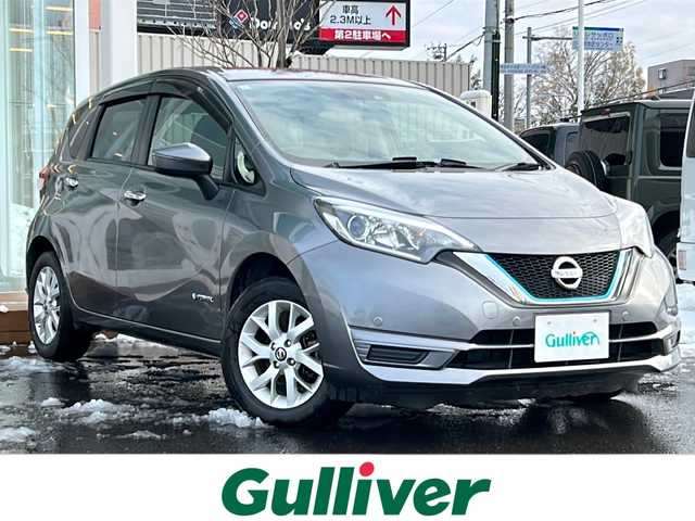 日産 ノート e－パワー X FOUR 道央・札幌 2018(平30)年 7.1万km ダークメタルグレー ・４WD/・衝突被害軽減システム/・純正メモリナビ/ＢＴ・ＣＤ・AUX・SD・TV/・バックカメラ/・コーナーセンサー/・レーンキープアシスト/・純正エンジンスターター/・ＥＴＣ/・横滑り防止装置/・ステアリングスイッチ/・ドライブモード切替スイッチ/・ヘッドライトレベライザー/・純正フロアマット/・ドアバイザー/・電動格納ミラー/・ウインカーミラー/・スマートキー/・プッシュスタートボタン