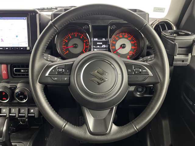 スズキ ジムニー シエラ JC 埼玉県 2023(令5)年 2.1万km ミディアムグレー 純正SDナビ/（BT/DVD/フルTV/CD/AM/FM）/スズキセーフティセンス/・クルーズコントロール/・オートハイビーム/シートヒーター/純正アルミホイール/純正フロアマット/ビルトインETC/スマートキー/スペア1本