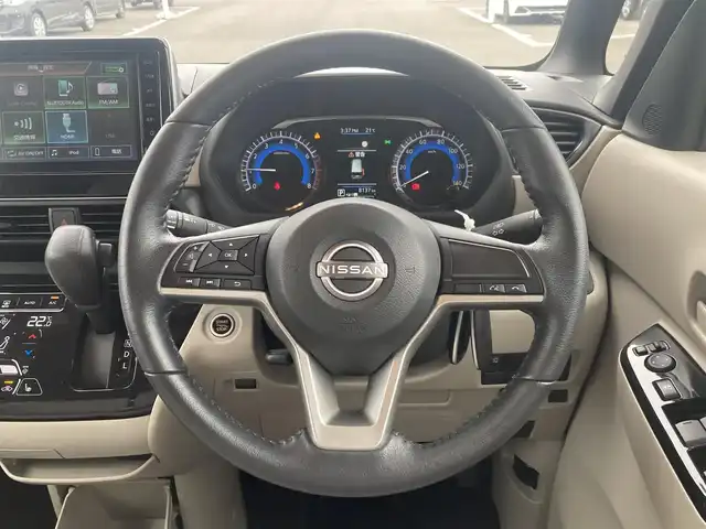 日産 ルークス X 栃木県 2023(令5)年 0.9万km ブロッサムピンク エマージェンシーブレーキ/純正9インチディスプレイオーディオ/AndroidAuto/AppleCarPlay/AM/FM/Bluetooth/アラウンドビューモニター/ハンズフリーパワースライドドア/ナビ連動前＋車内ドライブレコーダー/コーナーセンサー/ステアリングリモコン/純正WCP付サマータイヤ4本積込/スマートキー×2/プッシュスタート/保証書/取説