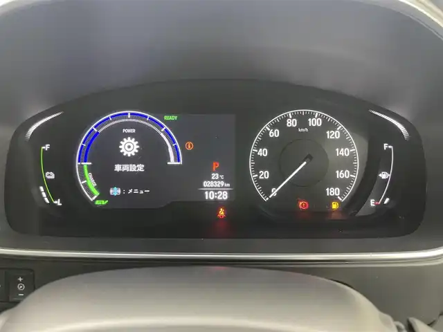 ホンダ オデッセイ ハイブリッド e:HEVアブソルート 岡山県 2022(令4)年 2.9万km プレミアムスパークルブラックパール 純正10インチナビ/（CD/DVD/BT/フルセグTV/Carplay）/バックカメラ/ステアリングスイッチ/ビルトインETC２．０/両側パワースライドドア/コーナーセンサー/オットマン付きシート/前後ドライブレコーダー/置くだけ充電/追従型クルーズコントロール/純正17インチアルミホイール/オートブレーキホールド/ISOFIX/ステアリングスイッチ/チルトステアリング/シートリフター/ウインカーミラー/ドアバイザー