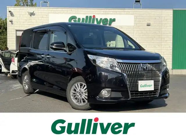 トヨタ エスクァイア Gi 島根県 2015(平27)年 10.3万km スパークリングブラックパールクリスタルシャイン 社外ナビ　/ワンセグＴＶ　/ＤＶＤ再生　/Ｂｌｕｅｔｏｏｔｈオーディオ　/バックカメラ　/ＥＴＣ　/両側パワースライドドア　/横滑り防止装置　/クルーズコントロール /前席シートヒーター /リアサーキュレーター /アイドリングストップ/純正LEDヘッドライト /純正フロアマット /ISOFIX