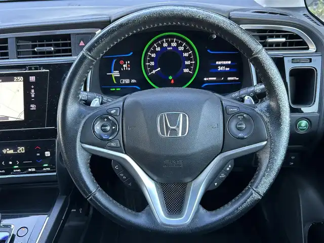 ホンダ シャトル ハイブリッド Z 道東・釧路十勝 2015(平27)年 8.6万km クリスタルブラックパール 寒冷地仕様/純正メモリナビ/（CD/DVD/BT/ラジオ）/フルセグTV/クルーズコントロール/社外エンジンスターター/スマートキー/社外AW夏タイヤ/社外AW冬タイヤ積込/ビルトインETC/ステアリングスイッチ/プッシュスタート/ドライブレコーダー/シートヒーター/オートライト/フォグランプ/保証書/記録簿/取扱説明書