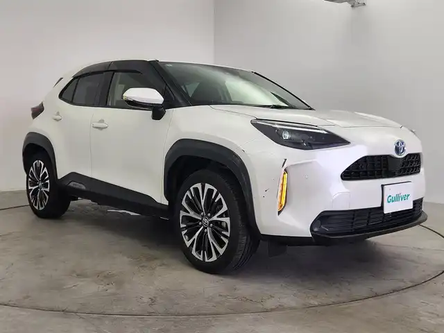 トヨタ ヤリスクロス ハイブリッド Z 愛知県 2022(令4)年 1.2万km ホワイトパールクリスタルシャイン ディスプレイオーディオ　/全方位カメラ　/追従クルコン　/シートヒーター　/パワーシート　/ハーフレザー　/前後ドラレコ　/BSM　/ＥＴＣ　/アルミホイール　/LEDライト　/オートハイビーム　/保証書　/取説　/記録簿