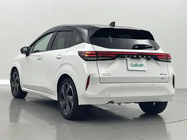 日産 オーラ G 熊本県 2023(令5)年 4万km ピュアホワイトパール / スーパーブラック 2トーン ワンオーナー　/BOSEサウンド/純正ナビ（ＡｐｐｌＣａｒＰｌａｙ・フルセグ・ＢＴ）/全周囲カメラ　/純正前方ドライブレコーダー（DH１５S）　/ビルトインＥＴＣ２．０/プロパイロット/ブラインドスポットモニター/インテリジェントエマージェンシーブレーキ/車線逸脱防止支援システム/後側方衝突防止支援アシスト/標識認識機能/前後クリアランスソナー　/レーダークルーズコントロール　/置くだけ充電/デジタルインナーミラー/ハーフレザーシート/純正フロアマット/純正17インチAW/オートライト/LEDヘッドライト/フォグランプ/スマートキー/プッシュスタート