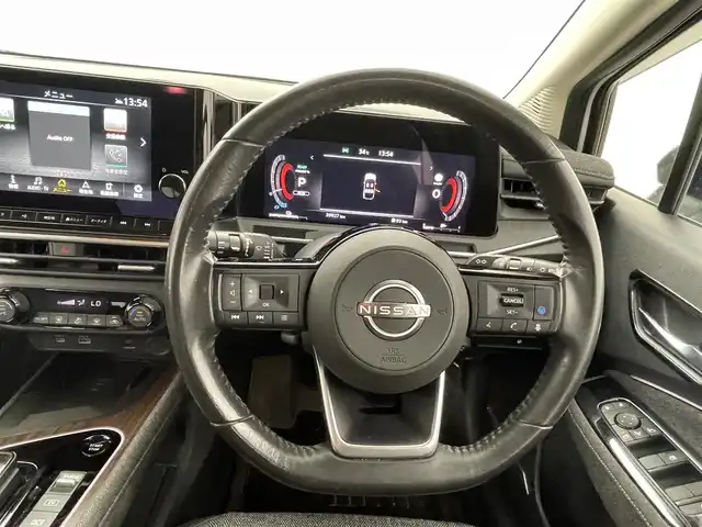 日産 オーラ G 熊本県 2023(令5)年 4万km ピュアホワイトパール / スーパーブラック 2トーン ワンオーナー　/BOSEサウンド/純正ナビ（ＡｐｐｌＣａｒＰｌａｙ・フルセグ・ＢＴ）/全周囲カメラ　/純正前方ドライブレコーダー（DH１５S）　/ビルトインＥＴＣ２．０/プロパイロット/ブラインドスポットモニター/インテリジェントエマージェンシーブレーキ/車線逸脱防止支援システム/後側方衝突防止支援アシスト/標識認識機能/前後クリアランスソナー　/レーダークルーズコントロール　/置くだけ充電/デジタルインナーミラー/ハーフレザーシート/純正フロアマット/純正17インチAW/オートライト/LEDヘッドライト/フォグランプ/スマートキー/プッシュスタート