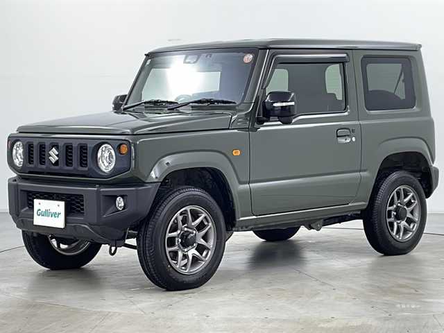 スズキ ジムニー XC 道央・札幌 2025(令7)年 0.2万km ジャングルグリーン ・４WD/・寒冷地仕様/・社外SDナビ/（CD DVD SD BT フルセグ）/・衝突軽減/・レーンキープアシスト/・クルーズコントロール/・ステアリングスイッチ/・D/Nシートヒーター/・ドアミラーヒーター/・LKA/・ダウンヒルアシスト/・LEDヘッドライト/・フォグランプ/・バックカメラ/・社外ドラレコ（前）/・純正１６インチAW
