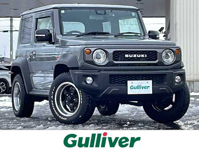 スズキ ジムニー シエラ JC 道北・旭川 2023(令5)年 4.2万km ミディアムグレー /4WD//禁煙車//ワンオーナー//純正メモリナビ//CD/DVD/SD/USB/BT/フルセグ//社外１６インチアルミホイール//ホワイトレタータイヤ//バックカメラ//スズキセーフティサポート//衝突軽減ブレーキ//レーンキープ//クルーズコントロール//アイドリングストップ//シートヒーター//ミラーヒーター//オートハイビーム//オートライト//LEDヘッドライト//フォグライト//ヘッドライトウォッシャー//ビルトインETC//前後ドライブレコーダー//オプショングリル//純正フロアマット//ドアバイザー//スマートキー//プッシュスタート