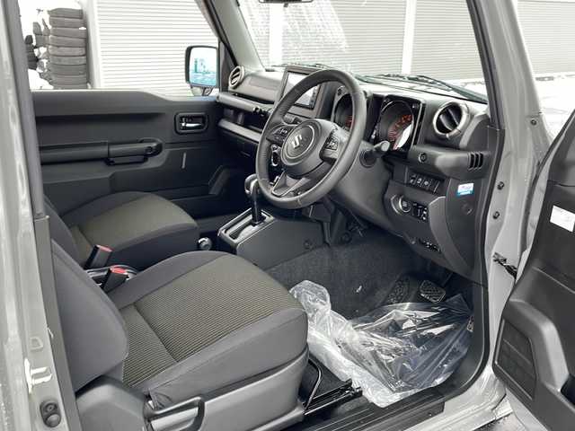 スズキ ジムニー シエラ JC 道北・旭川 2023(令5)年 4.2万km ミディアムグレー /4WD//禁煙車//ワンオーナー//純正メモリナビ//CD/DVD/SD/USB/BT/フルセグ//社外１６インチアルミホイール//ホワイトレタータイヤ//バックカメラ//スズキセーフティサポート//衝突軽減ブレーキ//レーンキープ//クルーズコントロール//アイドリングストップ//シートヒーター//ミラーヒーター//オートハイビーム//オートライト//LEDヘッドライト//フォグライト//ヘッドライトウォッシャー//ビルトインETC//前後ドライブレコーダー//オプショングリル//純正フロアマット//ドアバイザー//スマートキー//プッシュスタート