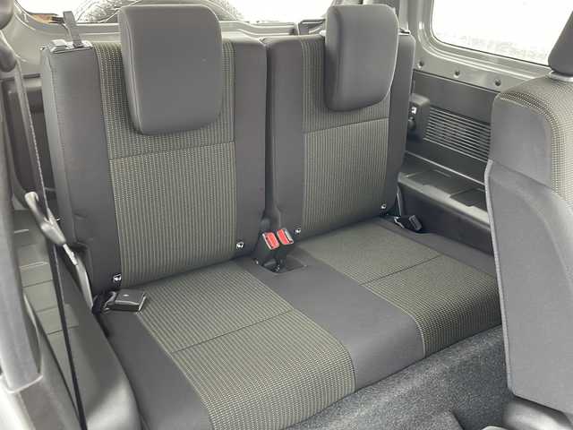 スズキ ジムニー シエラ JC 道北・旭川 2023(令5)年 4.2万km ミディアムグレー /4WD//禁煙車//ワンオーナー//純正メモリナビ//CD/DVD/SD/USB/BT/フルセグ//社外１６インチアルミホイール//ホワイトレタータイヤ//バックカメラ//スズキセーフティサポート//衝突軽減ブレーキ//レーンキープ//クルーズコントロール//アイドリングストップ//シートヒーター//ミラーヒーター//オートハイビーム//オートライト//LEDヘッドライト//フォグライト//ヘッドライトウォッシャー//ビルトインETC//前後ドライブレコーダー//オプショングリル//純正フロアマット//ドアバイザー//スマートキー//プッシュスタート