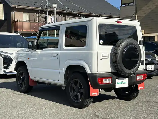 スズキ ジムニー XL 東京都 2021(令3)年 1.8万km スペリアホワイト Bluetooth接続可/バックカメラ/USB接続可/純正アルミホイール/社外フロアマット/シートヒーター/レーンキープアシスト/横滑り防止装置/盗難防止装置/衝突被害軽減システム/オートライト/背面タイヤ/ETC/ABS/W＋サイドエアバッグ/プッシュスタート/スマートキー/保証書、取扱説明書