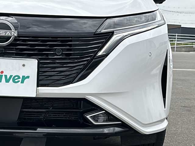 日産 オーラ G レザーエディション 佐賀県 2022(令4)年 2.1万km ピュアホワイトパール 純正メモリナビゲーション/・フルセグTV/Bluetooth/アラウンドビューモニター/BOSEプレミアムサウンド/デジタルインナーミラー/ステアリングヒーター/シートヒーター/ブラインドスポットモニター/USBポート/置くだけ充電/ビルトインETC2.0/純正LEDヘッドライト/純正17インチアルミホイール/純正フロアマット/新車保証書/プロパイロット/・エマージェンシーブレーキ/・車線逸脱警報/・車線逸脱防止支援