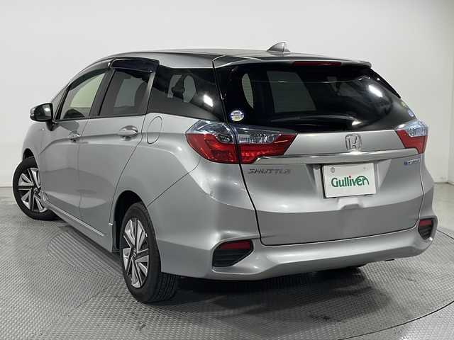 ホンダ シャトル ハイブリッド ホンダセンシング 広島県 2018(平30)年 6.5万km ルナシルバーM 禁煙車/社外7型ナビ/アダプティブクルーズコントロール/バックカメラ/ホンダセンシング/レーンキープ/横滑り防止装置/ドライブレコーダー/ビルトインETC/スマートキー/フロアマット