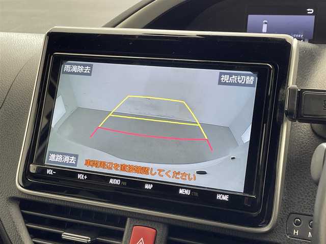 トヨタ ヴォクシー ZS 煌Ⅱ 滋賀県 2019(平31)年 7万km ホワイトパールクリスタルシャイン 禁煙車/純正9型ナビ/（BT/CD/DVD/SD/フルセグ）/純正12型フリップダウンモニター/両側電動スライドドア/ビルトインETC2.0/バックカメラ/衝突被害軽減ブレーキ/クルーズコントロール/レーンキープアシスト/オートハイビーム/ステアリングスイッチ/プッシュスタート/スマートキー/充電用USBポートx2/アイドリングストップ/LEDヘッドライト/合皮シートカバー