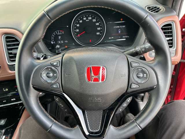 ホンダ ヴェゼル ツーリング・ホンダセンシング 和歌山県 2019(令1)年 5.7万km プレミアムクリスタルレッドM 社外ナビ/フルセグTV/（AM/FM/CD/DVD/Bluetooth/USB）/衝突軽減ブレーキ/レーンキープ/横滑り防止/クルーズコントロール/パドルシフト/ETC/ドライブレコーダー/オートライト/フォグランプ/スマートキー/プッシュスタート/ハンドルスイッチ/純正フロアマット/純正AW/革巻ハンドル/社外マフラー
