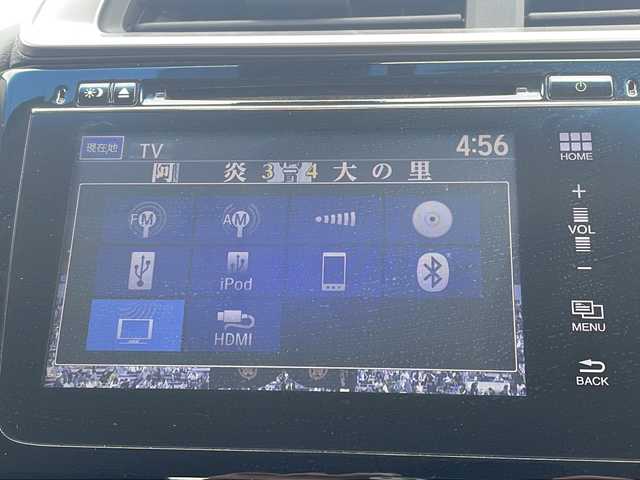 ホンダ フィット ハイブリット Fパッケージ 青森県 2014(平26)年 9.3万km プレミアムホワイトパール 4WD/純正メモリナビ・フルセグTV/CD・DVD・Bluetooth/バックカメラ/あんしんパッケージ/衝突軽減ブレーキ/サイド・カーテンエアバッグ/純正ビルトインETC/ヘッドライトレベライザー/ワイパーデアイサー/横滑り防止機能/プッシュスタート/スマートキー/純正フロアマット