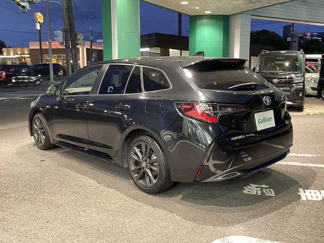 トヨタ カローラツーリング ハイブリッド ダブルバイビー 福島県 2021(令3)年 7.4万km ブラックマイカ 純正ナビ/CD/DVD、フルセグTV、ミュージックプレイヤー、BT/スマートキー/スペアキー/プッシュスタート/ドライブレコーダー/純正フロアマット/バックカメラ/純正AW/オートライト/レーンキープアシスト/コーナーセンサー/ABH/電格ミラー/ETC
