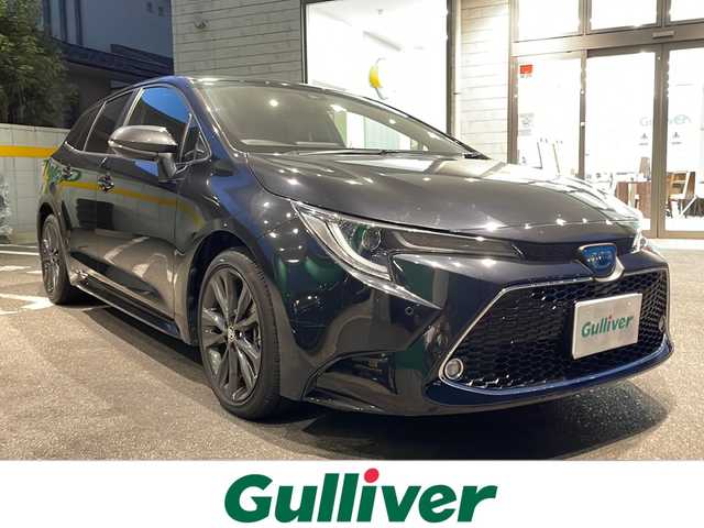 トヨタ カローラツーリング ハイブリッド ダブルバイビー 福島県 2021(令3)年 7.4万km ブラックマイカ 純正ナビ/CD/DVD、フルセグTV、ミュージックプレイヤー、BT/スマートキー/スペアキー/プッシュスタート/ドライブレコーダー/純正フロアマット/バックカメラ/純正AW/オートライト/レーンキープアシスト/コーナーセンサー/ABH/電格ミラー/ETC