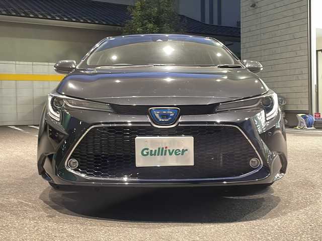 トヨタ カローラツーリング ハイブリッド ダブルバイビー 福島県 2021(令3)年 7.4万km ブラックマイカ 純正ナビ/CD/DVD、フルセグTV、ミュージックプレイヤー、BT/スマートキー/スペアキー/プッシュスタート/ドライブレコーダー/純正フロアマット/バックカメラ/純正AW/オートライト/レーンキープアシスト/コーナーセンサー/ABH/電格ミラー/ETC