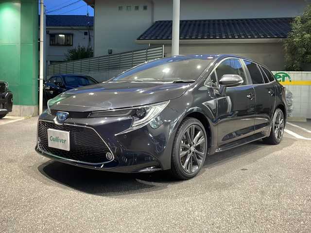 トヨタ カローラツーリング ハイブリッド ダブルバイビー 福島県 2021(令3)年 7.4万km ブラックマイカ 純正ナビ/CD/DVD、フルセグTV、ミュージックプレイヤー、BT/スマートキー/スペアキー/プッシュスタート/ドライブレコーダー/純正フロアマット/バックカメラ/純正AW/オートライト/レーンキープアシスト/コーナーセンサー/ABH/電格ミラー/ETC