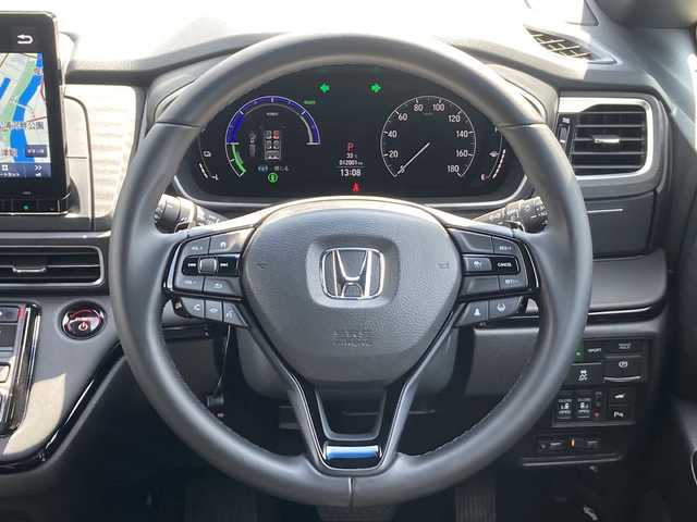 ホンダ オデッセイ ハイブリッド e:HEVアブソルート EXブラックED 佐賀県 2023(令5)年 1.2万km プラチナホワイトパール Gathers11.4インチナビ/Gathers15.6インチフリップダウンモニター/マルチビューモニター/両側パワースライドドア/衝突被害軽減ブレーキ/路線逸脱警報/コーナーセンサー/ブラインドスポットインフォメーション/アダプティブクルーズコントロール/電動パーキングブレーキ/オートブレーキホールド/レザーシート/パワーシート/シートヒーター/オットマン/パワーバックドア/ETC/置くだけ充電/ステアリングリモコン/プッシュスタート/スマートキー/LEDヘッドライト/フォグライト/純正ブラックアルミホイール