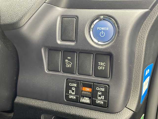 トヨタ ヴォクシー ハイブリッド V 沖縄県 2014(平26)年 10.9万km ブラッキッシュアゲハガラスフレーク 純正9インチナビ(ＮＳＺＴ－Ｙ６２Ｇ)　/(フルセグＴＶ　Ｂｌｕｅｔｏｏｔｈ　ＣＤ　ＤＶＤ　ＡＭ　ＦＭ)　/バックカメラ　/ビルトインＥＴＣ　/フリップダウンモニター　/両側パワースライドドア　/クルーズコントロール/シートヒーター/スマートキー/プッシュスタート　/ＬＥＤヘッドライト　/オートライト/禁煙車/社外アルミホイール/純正フロアマット/保証書/取扱説明書