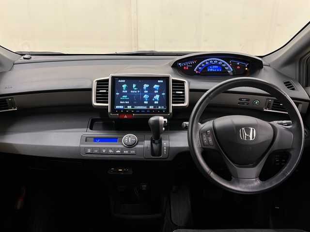 ホンダ フリード スパイク G エアロ 道央・札幌 2015(平27)年 12.8万km グラマラスモーブP ４WD/両側パワースライドドア/横滑り防止装置/アイドリングストップ/オートエアコン/オートライト/HIDヘッドライト/純正ナビ/（CD/DVD/フルセグ/Bluetooth）/ステアリングスイッチ/バックカメラ/ETC/熱線入りフロントウインドウ/ドアミラーウインカー/純正15インチアルミホイール