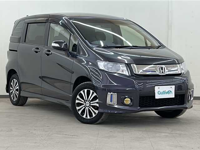 ホンダ フリード スパイク G エアロ 道央・札幌 2015(平27)年 12.8万km グラマラスモーブP ４WD/両側パワースライドドア/横滑り防止装置/アイドリングストップ/オートエアコン/オートライト/HIDヘッドライト/純正ナビ/（CD/DVD/フルセグ/Bluetooth）/ステアリングスイッチ/バックカメラ/ETC/熱線入りフロントウインドウ/ドアミラーウインカー/純正15インチアルミホイール