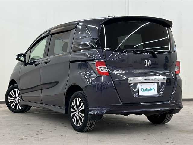 ホンダ フリード スパイク G エアロ 道央・札幌 2015(平27)年 12.8万km グラマラスモーブP ４WD/両側パワースライドドア/横滑り防止装置/アイドリングストップ/オートエアコン/オートライト/HIDヘッドライト/純正ナビ/（CD/DVD/フルセグ/Bluetooth）/ステアリングスイッチ/バックカメラ/ETC/熱線入りフロントウインドウ/ドアミラーウインカー/純正15インチアルミホイール