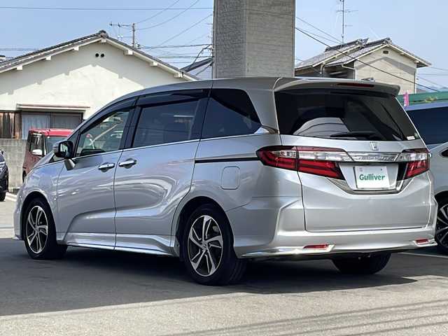 ホンダ オデッセイ アブソルートXホンダセンシングアドバンP 愛媛県 2016(平28)年 5.8万km スーパープラチナメタリック 登録時走行距離57869km/ワンオーナー /メーカーオプションナビ/両側パワースライドドア/全方位カメラ/ビルトインETC/ホンダセンシング /・衝突軽減ブレーキ/・横滑り防止装置/・レーンキープアシスト/・レーダークルーズコントロール/D席パワーシート/パドルシフト/3列シート/ハーフレザーシート/スペアキー/スマートキー/プッシュスタート /保証書