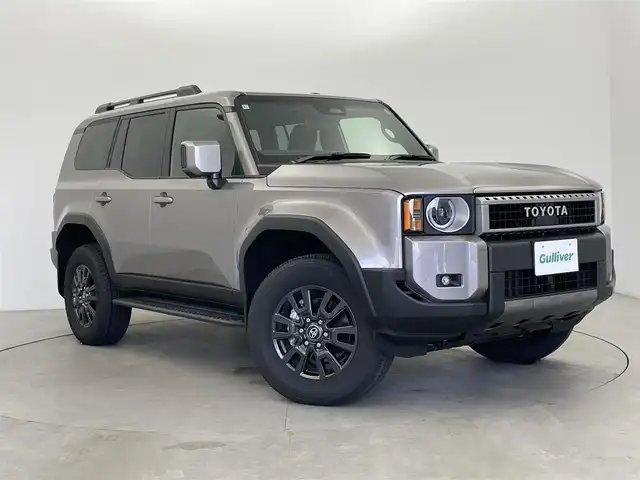 トヨタ ランドクルーザー ２５０ VX 富山県 2024(令6)年 0.3万km アバンギャルドブロンズメタリック サンルーフ/黒革シート（合皮）/運転席パワーシート/前席シートエアコン/ステアリングヒーター/ステップ/純正ナビ（BT、AppleCarPlay）/フルセグTV/360度カメラ/前後コーナーセンサー/ビルトインETC/HDMI端子/パワーバックドア/デジタルインターミラー/LEDヘッドライト/フォグ/ACC/プリクラッシュセーフティ（PCS）/レーンディパーチャーアラート/ブラインドスポット/発進遅れ告知/後方車両接近告知/スペアキー