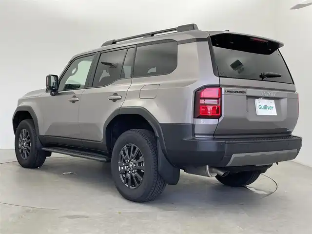 トヨタ ランドクルーザー ２５０ VX 富山県 2024(令6)年 0.3万km アバンギャルドブロンズメタリック サンルーフ/黒革シート（合皮）/運転席パワーシート/前席シートエアコン/ステアリングヒーター/ステップ/純正ナビ（BT、AppleCarPlay）/フルセグTV/360度カメラ/前後コーナーセンサー/ビルトインETC/HDMI端子/パワーバックドア/デジタルインターミラー/LEDヘッドライト/フォグ/ACC/プリクラッシュセーフティ（PCS）/レーンディパーチャーアラート/ブラインドスポット/発進遅れ告知/後方車両接近告知/スペアキー