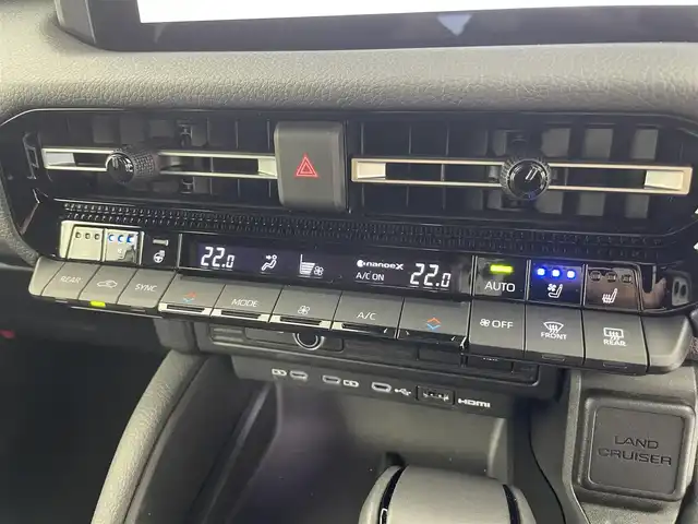 トヨタ ランドクルーザー ２５０ VX 富山県 2024(令6)年 0.3万km アバンギャルドブロンズメタリック サンルーフ/黒革シート（合皮）/運転席パワーシート/前席シートエアコン/ステアリングヒーター/ステップ/純正ナビ（BT、AppleCarPlay）/フルセグTV/360度カメラ/前後コーナーセンサー/ビルトインETC/HDMI端子/パワーバックドア/デジタルインターミラー/LEDヘッドライト/フォグ/ACC/プリクラッシュセーフティ（PCS）/レーンディパーチャーアラート/ブラインドスポット/発進遅れ告知/後方車両接近告知/スペアキー