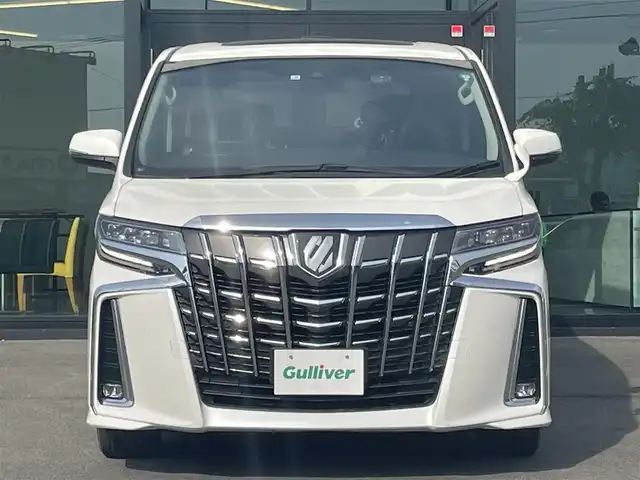 トヨタ アルファード S Cパッケージ 愛媛県 2021(令3)年 2.9万km ホワイトパールクリスタルシャイン サンルーフ/プリクラッシュセーフティ/レーントレーシングアシスト/パーキングサポートブレーキ/ロードサインアシスト/クリアランスソナー /レーダークルーズコントロール/純正デイスプレイオーディオ/　CD/DVD/Bluetooth/ワンセグTV/TVキャンセラー付き/バックカメカメラ/前後ドライブレコーダー/ ビルトインETC/両側パワースライドドア/黒革シート/前席パワーシート/前席シートヒーター/シートベンチレーション/オートライト/三眼LEDヘッドライト/ステアリングヒーター/純正18インチAW/プッシュスタート/フロアマット