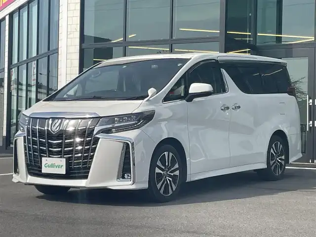 トヨタ アルファード S Cパッケージ 愛媛県 2021(令3)年 2.9万km ホワイトパールクリスタルシャイン サンルーフ/プリクラッシュセーフティ/レーントレーシングアシスト/パーキングサポートブレーキ/ロードサインアシスト/クリアランスソナー /レーダークルーズコントロール/純正デイスプレイオーディオ/　CD/DVD/Bluetooth/ワンセグTV/TVキャンセラー付き/バックカメカメラ/前後ドライブレコーダー/ ビルトインETC/両側パワースライドドア/黒革シート/前席パワーシート/前席シートヒーター/シートベンチレーション/オートライト/三眼LEDヘッドライト/ステアリングヒーター/純正18インチAW/プッシュスタート/フロアマット