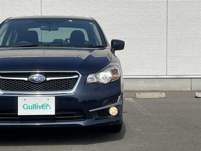 スバル インプレッサ Ｇ４ 1．6i－L 新潟県 2016(平28)年 7.6万km ダークブルーパール ４WD/社外ナビ/バックカメラ/リモコンキー/純正エンジンスターター/アイドリングストップ/プッシュスタート/MTモード付AT/ステアリングスイッチ/ETC/パドルシフト/社外フロアマット/社外ドアバイザー/オートライト/オートエアコン/パワーステアリング/パワーウィンドウ/横滑り防止/盗難防止装置/寒冷地仕様/電動格納ミラー/保証書/取扱説明書/記録簿