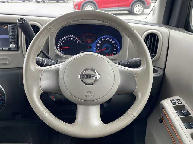 日産 キューブ 15G 山口県 2009(平21)年 17.6万km ベージュ 禁煙車　ローダウン　社外１５インチアルミホイール　ガラスルーフ　ベンチシート　純正ナビ　バックカメラ　フルセグＴＶ　スマートキー　プッシュスタート　ＥＴＣ　オートエアコン　電動格納ミラー　アームレスト