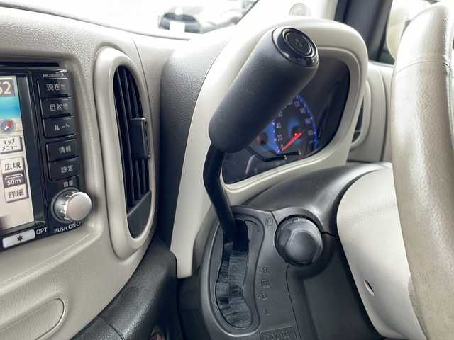 日産 キューブ 15G 山口県 2009(平21)年 17.6万km ベージュ 禁煙車　ローダウン　社外１５インチアルミホイール　ガラスルーフ　ベンチシート　純正ナビ　バックカメラ　フルセグＴＶ　スマートキー　プッシュスタート　ＥＴＣ　オートエアコン　電動格納ミラー　アームレスト