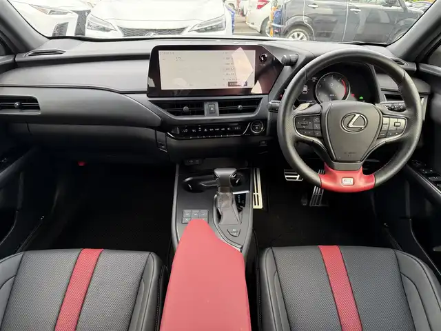 レクサス ＵＸ 250h Fスポーツ エモーショナルエクスプローラ 東京都 2023(令5)年 0.9万km ベージュM/ウォームグレーM ワンオーナー/純正ナビ　/（フルセグTV/FM/AM/Bluetooth/Miracast/USB)/ドライブレコーダー/ブラインドスポットモニター/プリクラッシュセーフティ/ETC2.0/レザーシート/レーダークルーズコントロール/革巻きステアリング/ステアリングスイッチ/パドルシフト/スマートキー/プッシュスタート/ステアリングヒーター/シートヒーター/エアシート/車線逸脱/横滑り防止装置/トノカバー/フロント・リアコーナーセンサー/トノカバー/ISOFIX/電動格納ウインカーミラー/リアプライバシーガラス/新車時保証書/記録簿/取扱説明書