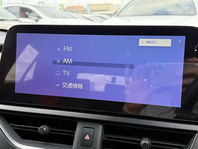 レクサス ＵＸ 250h Fスポーツ エモーショナルエクスプローラ 東京都 2023(令5)年 0.9万km ベージュM/ウォームグレーM ワンオーナー/純正ナビ　/（フルセグTV/FM/AM/Bluetooth/Miracast/USB)/ドライブレコーダー/ブラインドスポットモニター/プリクラッシュセーフティ/ETC2.0/レザーシート/レーダークルーズコントロール/革巻きステアリング/ステアリングスイッチ/パドルシフト/スマートキー/プッシュスタート/ステアリングヒーター/シートヒーター/エアシート/車線逸脱/横滑り防止装置/トノカバー/フロント・リアコーナーセンサー/トノカバー/ISOFIX/電動格納ウインカーミラー/リアプライバシーガラス/新車時保証書/記録簿/取扱説明書