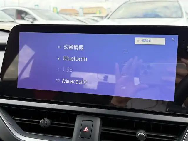 レクサス ＵＸ 250h Fスポーツ エモーショナルエクスプローラ 東京都 2023(令5)年 0.9万km ベージュM/ウォームグレーM ワンオーナー/純正ナビ　/（フルセグTV/FM/AM/Bluetooth/Miracast/USB)/ドライブレコーダー/ブラインドスポットモニター/プリクラッシュセーフティ/ETC2.0/レザーシート/レーダークルーズコントロール/革巻きステアリング/ステアリングスイッチ/パドルシフト/スマートキー/プッシュスタート/ステアリングヒーター/シートヒーター/エアシート/車線逸脱/横滑り防止装置/トノカバー/フロント・リアコーナーセンサー/トノカバー/ISOFIX/電動格納ウインカーミラー/リアプライバシーガラス/新車時保証書/記録簿/取扱説明書