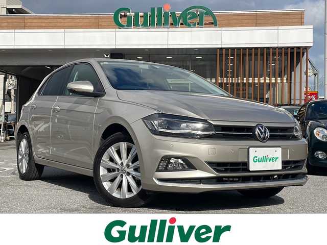 フォルクスワーゲン ポロ TSIハイライン 沖縄県 2018(平30)年 7万km ゴールド メーカーオプションナビ/バックカメラ/オーディオ（Ｂｌｕｅｔｏｏｔｈ、ＤＶＤ、ＣＤ）/ＥＴＣ/スマートキー/プッシュスタート/ステアリングスイッチ/パドルシフト/レーダークルーズコントロール/ＬＥＤヘッドライト/フォグライト/ウィンカーミラー