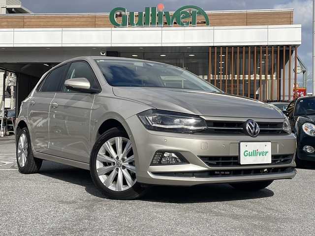 フォルクスワーゲン ポロ TSIハイライン 沖縄県 2018(平30)年 7万km ゴールド メーカーオプションナビ/バックカメラ/オーディオ（Ｂｌｕｅｔｏｏｔｈ、ＤＶＤ、ＣＤ）/ＥＴＣ/スマートキー/プッシュスタート/ステアリングスイッチ/パドルシフト/レーダークルーズコントロール/ＬＥＤヘッドライト/フォグライト/ウィンカーミラー