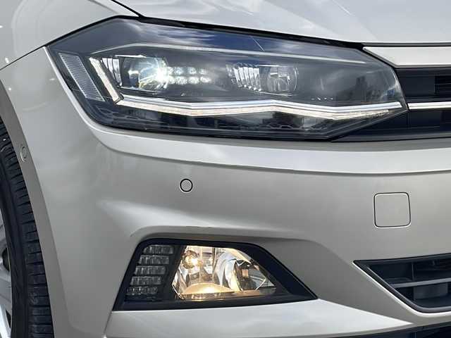 フォルクスワーゲン ポロ TSIハイライン 沖縄県 2018(平30)年 7万km ゴールド メーカーオプションナビ/バックカメラ/オーディオ（Ｂｌｕｅｔｏｏｔｈ、ＤＶＤ、ＣＤ）/ＥＴＣ/スマートキー/プッシュスタート/ステアリングスイッチ/パドルシフト/レーダークルーズコントロール/ＬＥＤヘッドライト/フォグライト/ウィンカーミラー