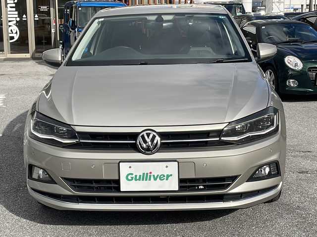 フォルクスワーゲン ポロ TSIハイライン 沖縄県 2018(平30)年 7万km ゴールド メーカーオプションナビ/バックカメラ/オーディオ（Ｂｌｕｅｔｏｏｔｈ、ＤＶＤ、ＣＤ）/ＥＴＣ/スマートキー/プッシュスタート/ステアリングスイッチ/パドルシフト/レーダークルーズコントロール/ＬＥＤヘッドライト/フォグライト/ウィンカーミラー