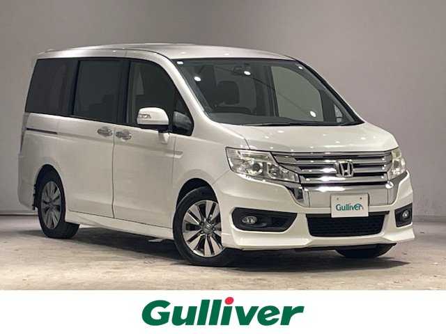 ホンダ ステップワゴン スパーダ S 宮城県 2015(平27)年 6.5万km ホワイトオーキッドパール 純正ナビ/（型番：VXM-155VFNi）/・バックカメラ/・Bluetooth/CD/DVD/・USB入力端子/HDMI/・純正ビルトインETC/・社外ドライブレコーダー/クルーズコントロール/片側パワースライドドア/プッシュスタート/アイドリングストップ/パドルシフト/3列シート/・ベンチシート/HIDヘッドライト/・オートライト/・フォグライト/純正アルミホイール/純正フロアマット