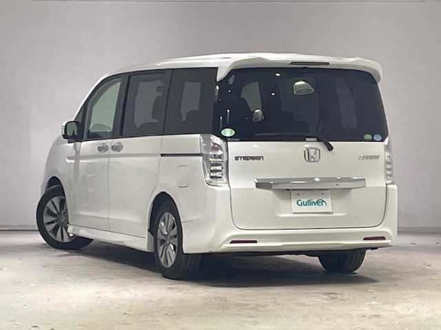 ホンダ ステップワゴン スパーダ S 宮城県 2015(平27)年 6.5万km ホワイトオーキッドパール 純正ナビ/（型番：VXM-155VFNi）/・バックカメラ/・Bluetooth/CD/DVD/・USB入力端子/HDMI/・純正ビルトインETC/・社外ドライブレコーダー/クルーズコントロール/片側パワースライドドア/プッシュスタート/アイドリングストップ/パドルシフト/3列シート/・ベンチシート/HIDヘッドライト/・オートライト/・フォグライト/純正アルミホイール/純正フロアマット